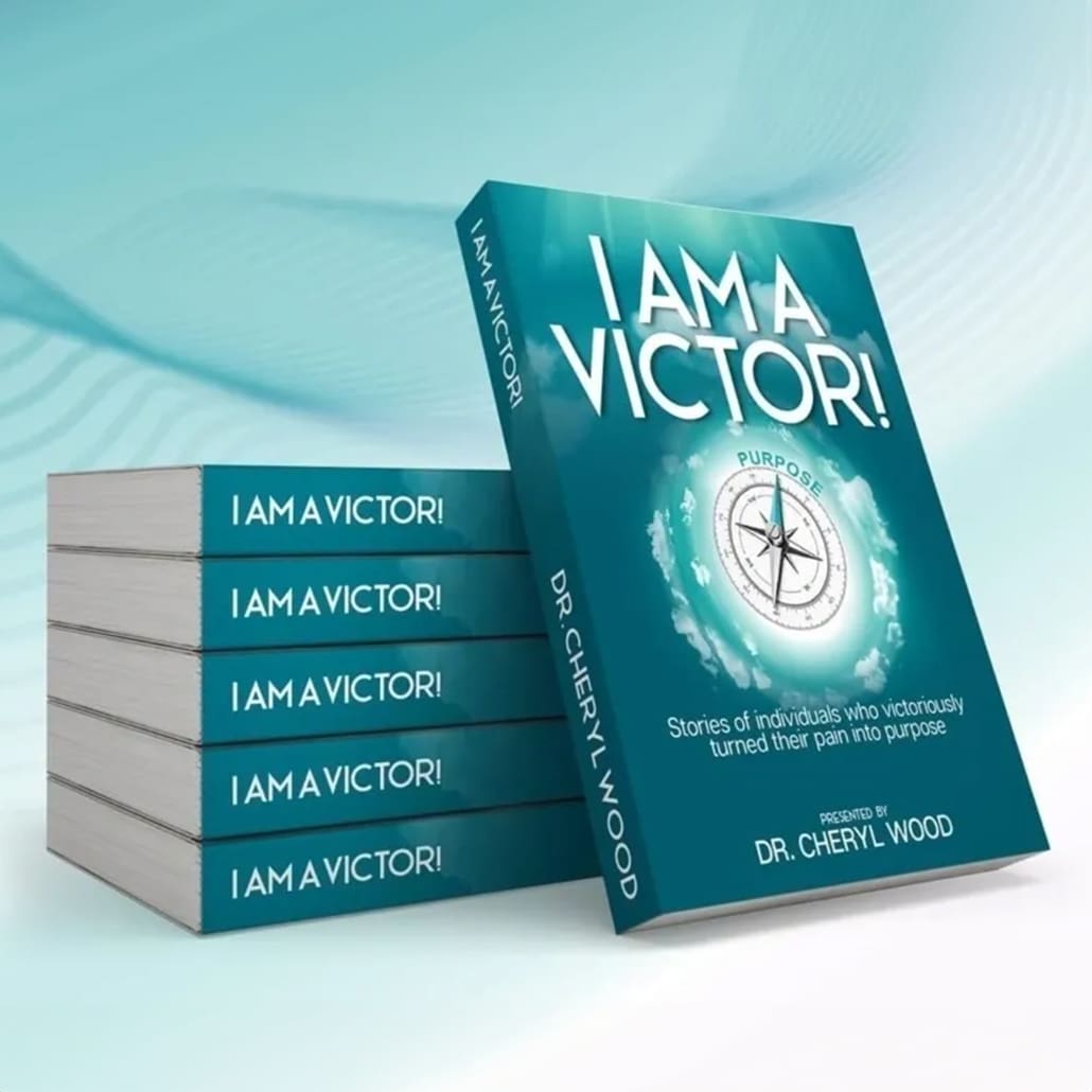 A stack of books with the words " i am a victory !" on them.